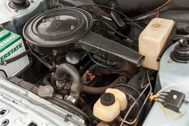 Pope John Paul II 1976 Ford Escort GL Auction rm sotheby's sedan light blue cars vehicles