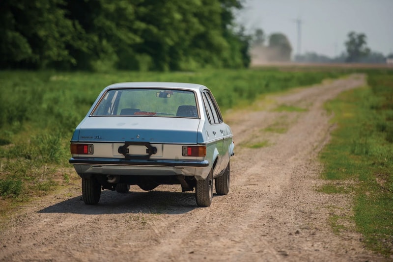 Pope John Paul II 1976 Ford Escort GL Auction rm sotheby's sedan light blue cars vehicles