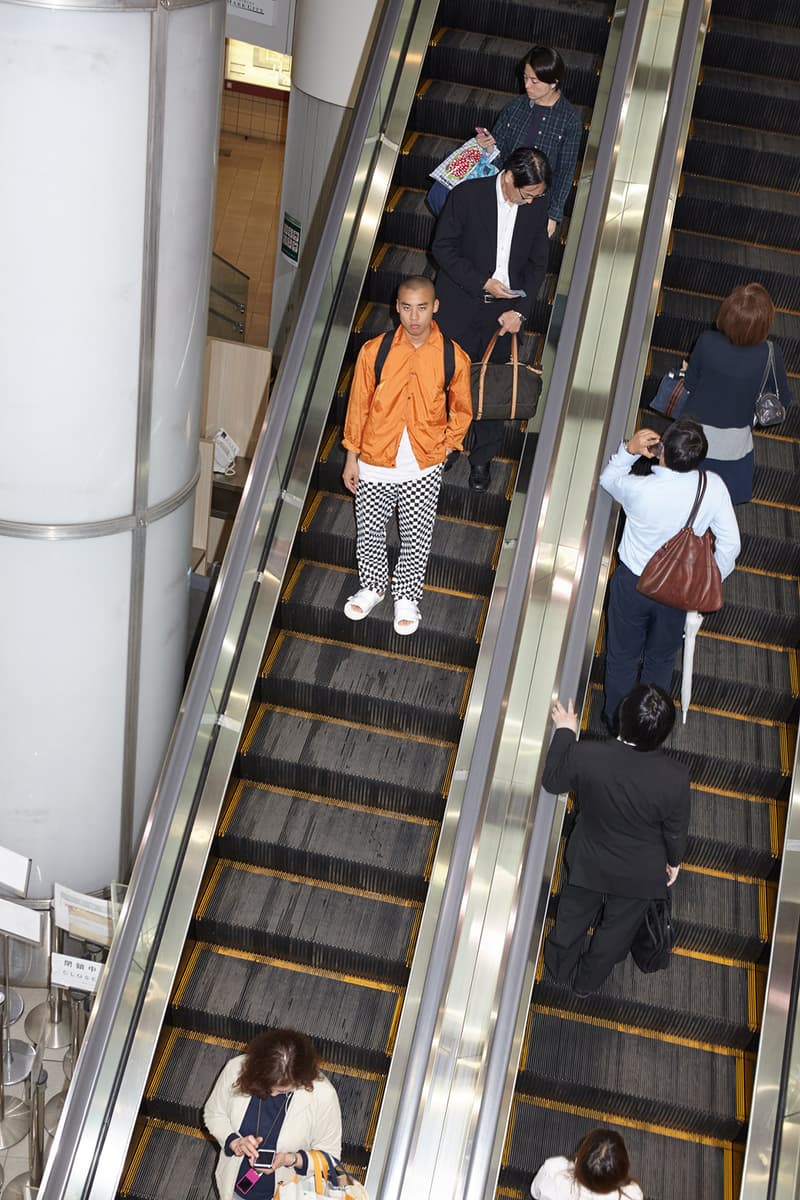 suicoke slam jam spring summer 2018 lookbook white sandal checkerboard black pants coaches jacket white tee shirt escalator