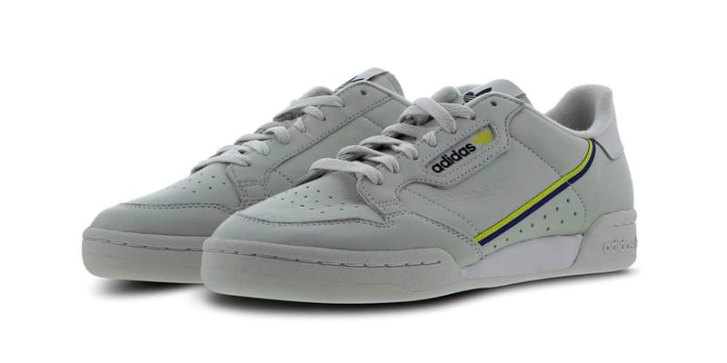 yellow adidas continental 80