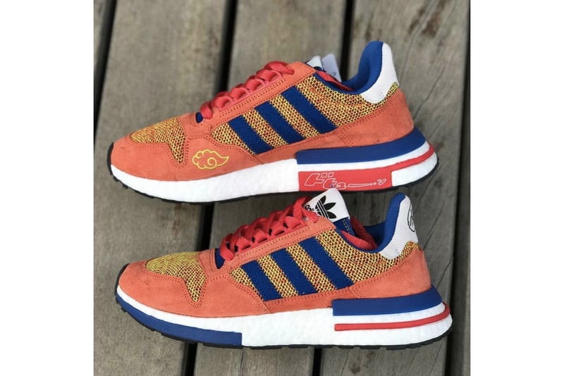 dragon ball z adidas goku collaboration zx 500 rm sneaker orange navy suede nimbus cloud boost midsole go symbol logo insignia heel ankle mesh laces orange navy side profile