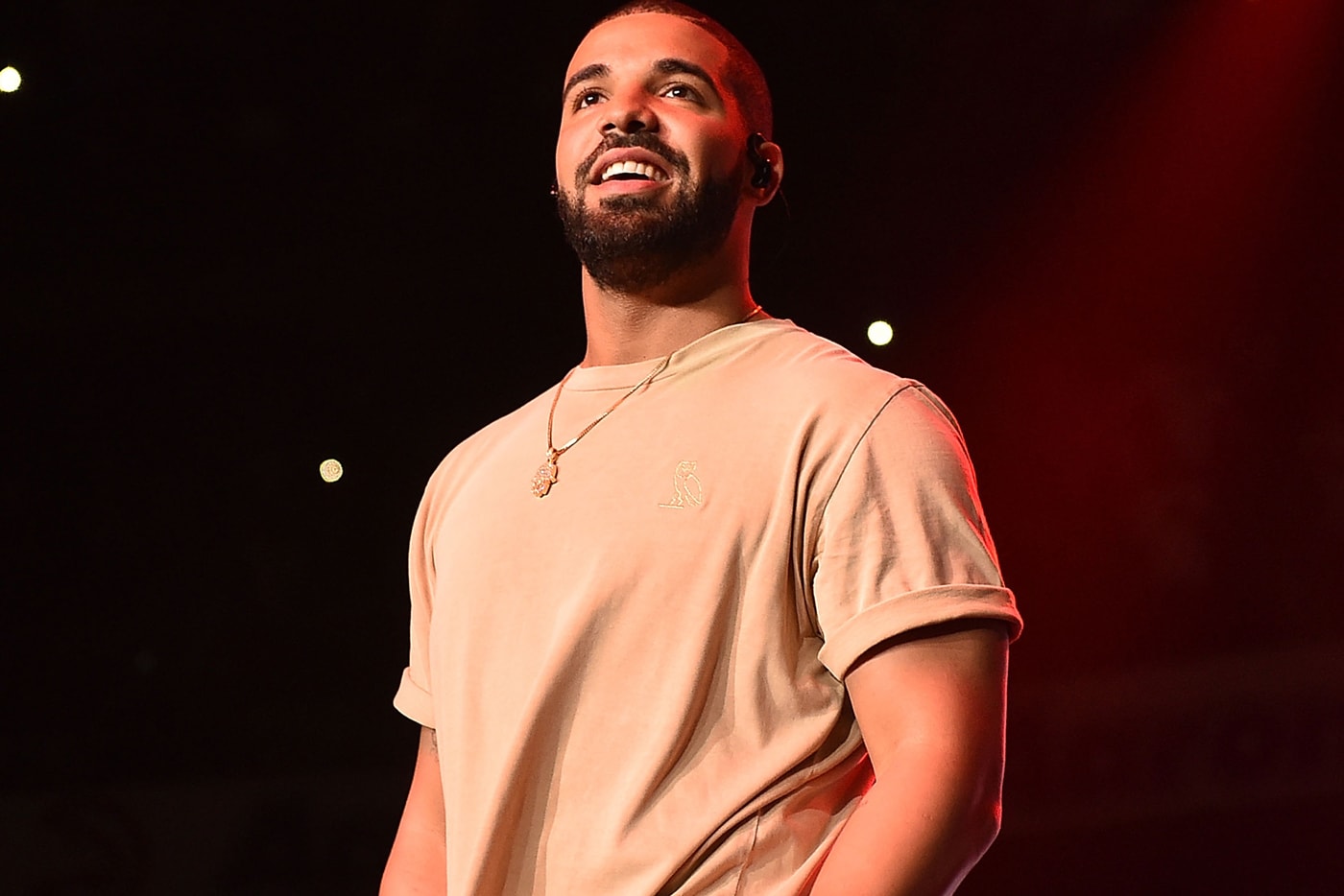 Hip Hop R&B Passes Rock Most Consumed Genre in US drake concert stage performance stone island