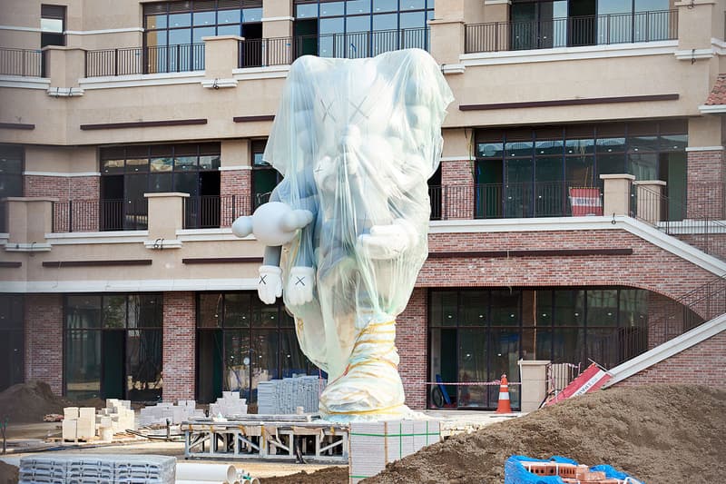 kaws companion sculpture south korea where the end starts statue installation