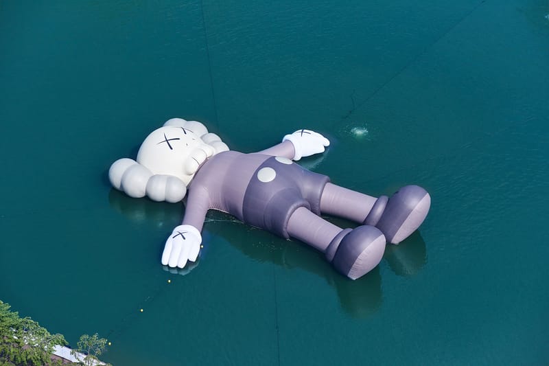 Catch The Extra Large-Scale 'KAWS:HOLIDAY' Sculpture Set Sail in Seoul's Seokchon Lake