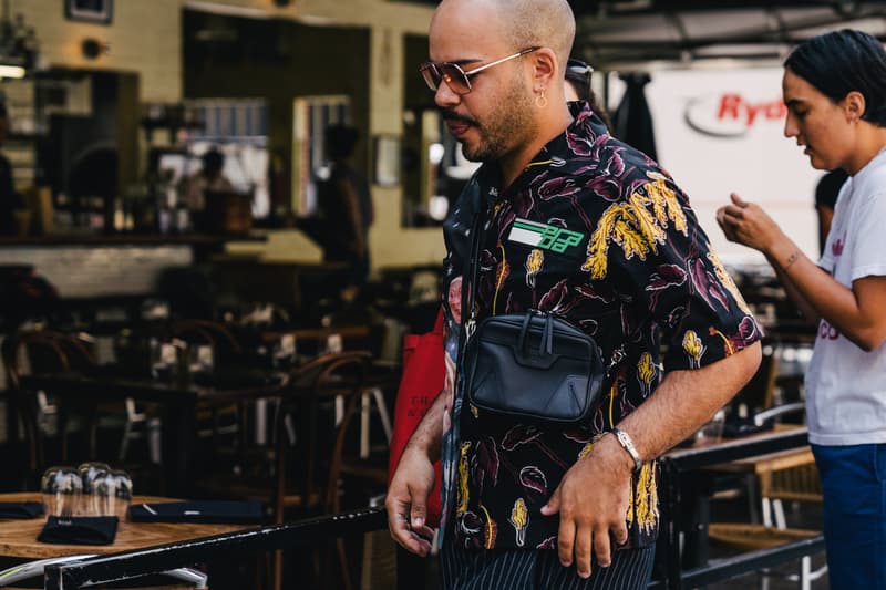 new york fashion week spring summer 2019 city street style snap photograph balenciaga nike off white ufc blue white air jordan 1 prada shirt leather vest floral tropical pattern football soccer jersey comme des garcons pink sneaker bapesta desert rat black