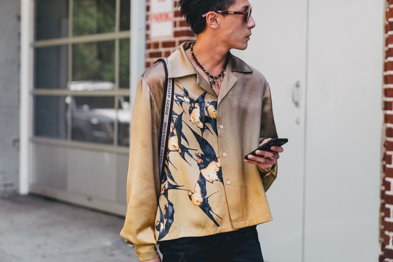 new york fashion week spring summer 2019 city street style snap photograph balenciaga nike off white ufc blue white air jordan 1 prada shirt leather vest floral tropical pattern football soccer jersey comme des garcons pink sneaker bapesta desert rat black