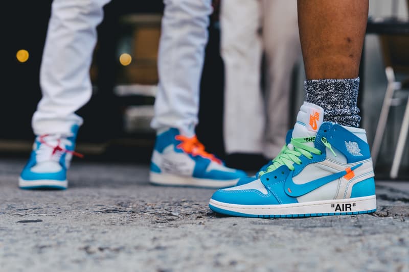 new york fashion week spring summer 2019 city street style snap photograph balenciaga nike off white ufc blue white air jordan 1 prada shirt leather vest floral tropical pattern football soccer jersey comme des garcons pink sneaker bapesta desert rat black