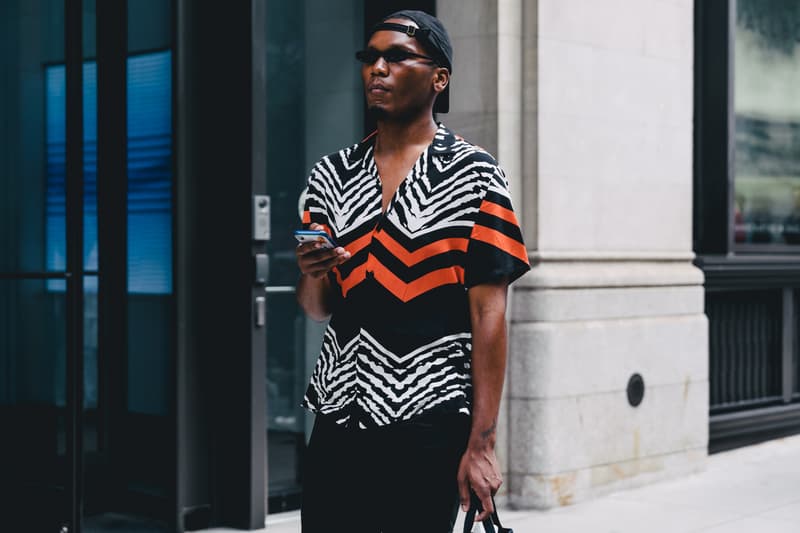 new york fashion week spring summer 2019 city street style snap photograph balenciaga nike off white ufc blue white air jordan 1 prada shirt leather vest floral tropical pattern football soccer jersey comme des garcons pink sneaker bapesta desert rat black