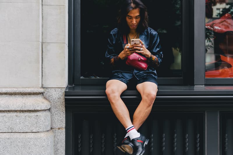 new york fashion week spring summer 2019 city street style snap photograph balenciaga nike off white ufc blue white air jordan 1 prada shirt leather vest floral tropical pattern football soccer jersey comme des garcons pink sneaker bapesta desert rat black