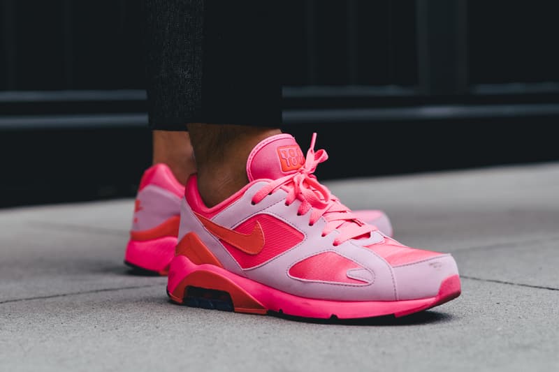 new york fashion week spring summer 2019 city street style snap photograph balenciaga nike off white ufc blue white air jordan 1 prada shirt leather vest floral tropical pattern football soccer jersey comme des garcons pink sneaker bapesta desert rat black