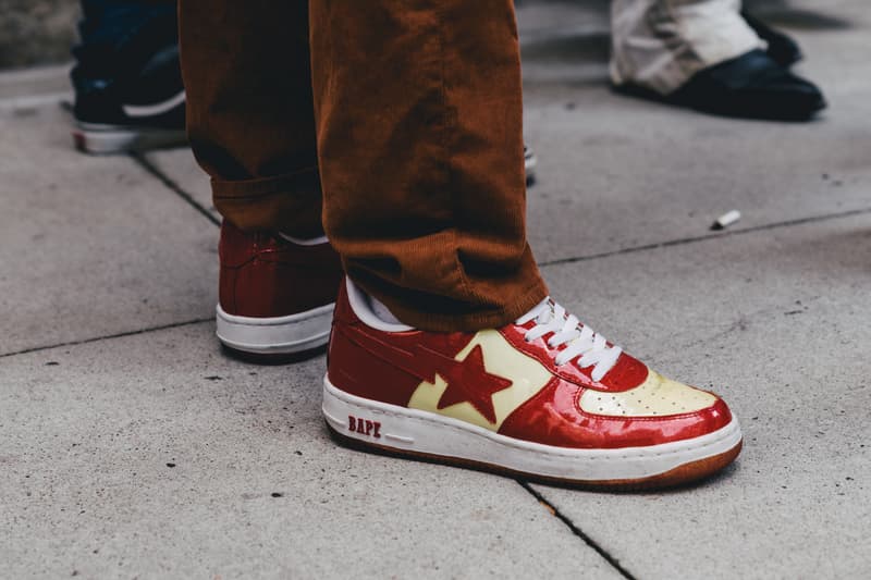 new york fashion week spring summer 2019 city street style snap photograph balenciaga nike off white ufc blue white air jordan 1 prada shirt leather vest floral tropical pattern football soccer jersey comme des garcons pink sneaker bapesta desert rat black