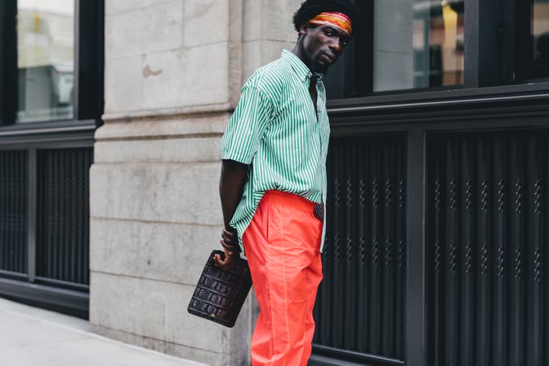 new york fashion week spring summer 2019 city street style snap photograph balenciaga nike off white ufc blue white air jordan 1 prada shirt leather vest floral tropical pattern football soccer jersey comme des garcons pink sneaker bapesta desert rat black