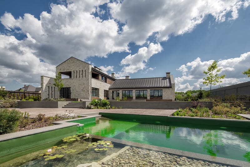 33bY Conceives Spacious Wood & Stone Abode in Ukraine