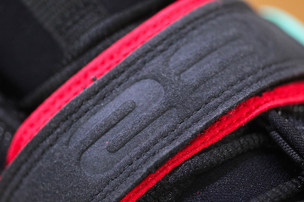Tinker Hatfield Alternate Air Jordan 13 OG Bred colorway black and red sneaker first look release date availability