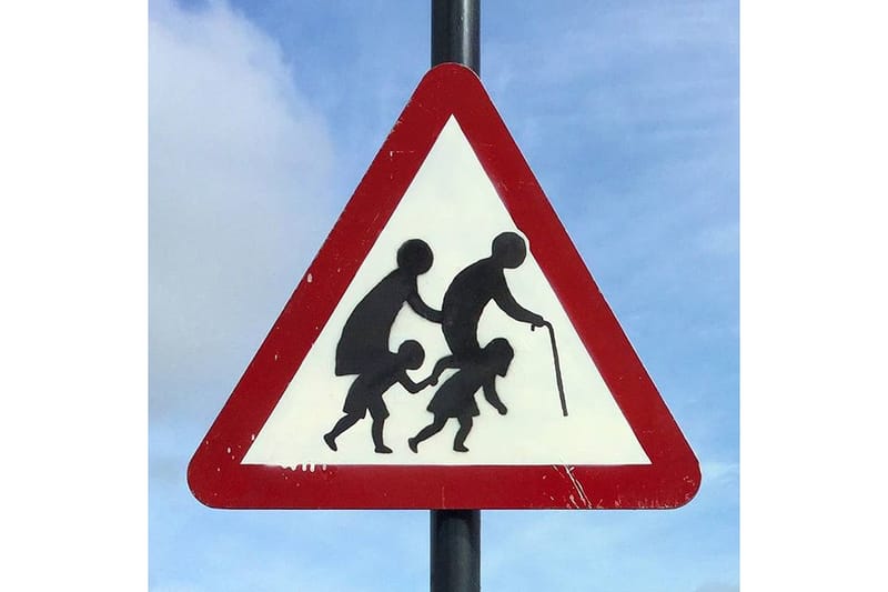 Banksy Reveals New Street Sign Artwork in England