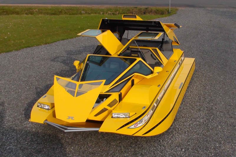 hydrocar surface orbiter transformable amphibious car vehicle water road street 1 one million usd auction sale yellow boat Rick Dobbertin Worldwide Auctioneers