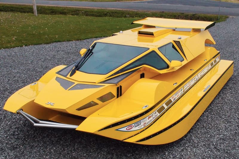 hydrocar surface orbiter transformable amphibious car vehicle water road street 1 one million usd auction sale yellow boat Rick Dobbertin Worldwide Auctioneers