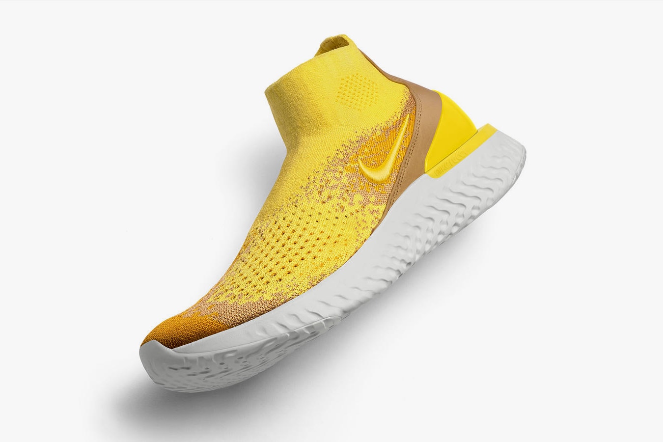 nike rise react flyknit laceless yellow running sneaker white sole
