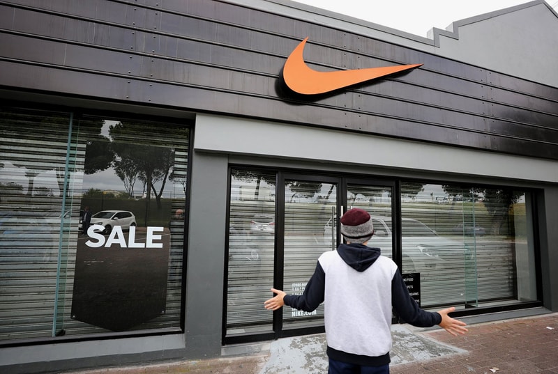 nike south africa store close racist video clip beach Adam Catzavelos slur apartheid economic freedom fighters resort merchandising manager johannesburg sandton mall retail