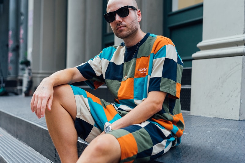 supreme fall winter 2018 drop day first august 16 madonna tee shirt melton wool leather sleeve varsity jacket stickers bouncey ball keychain black graphic tee shirt street style snap audience crowd fans line queue new york city brooklyn