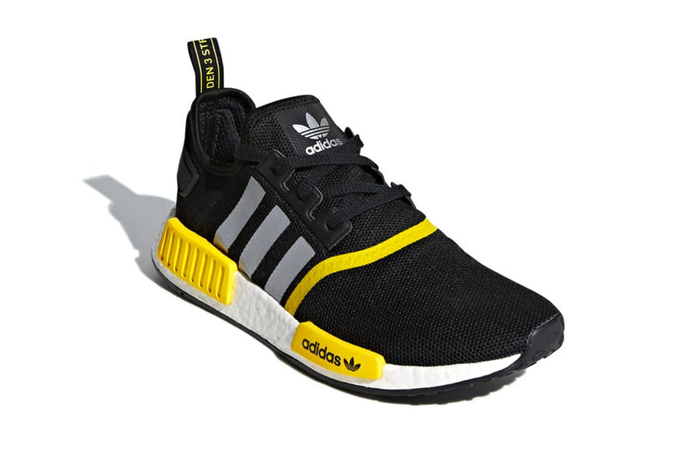 nmd r1 black and yellow