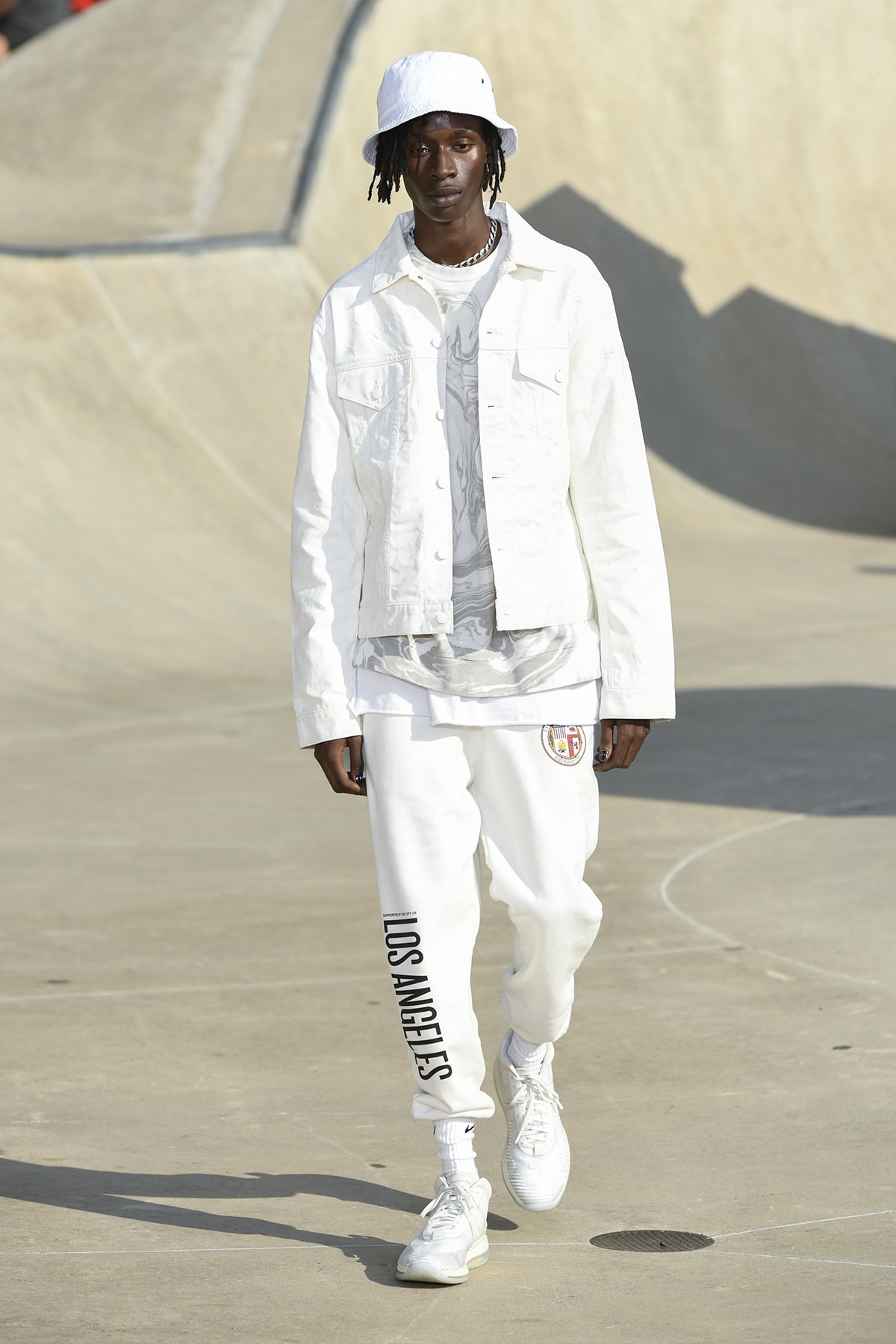 John Elliott spring summer 2019 runway collection sheck wes suicoke nike blackmeans mars jewelry sneaker shoe first look new york pier 62 skatepark justin bieber lebron james collaboration exclusive drop release date info tie dye denim acg