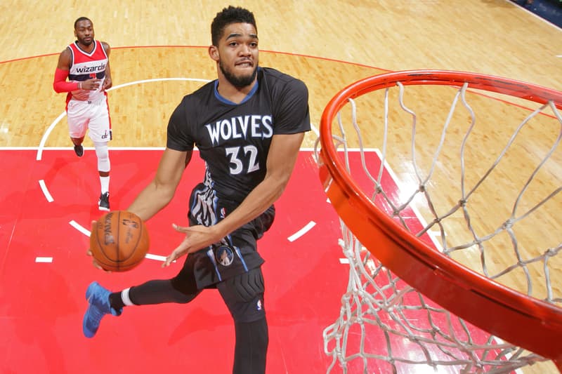 karl anthony towns nba minnesota timberwolves t wolves basketball john wall washington dc wizards game dunk rim windmill black jersey