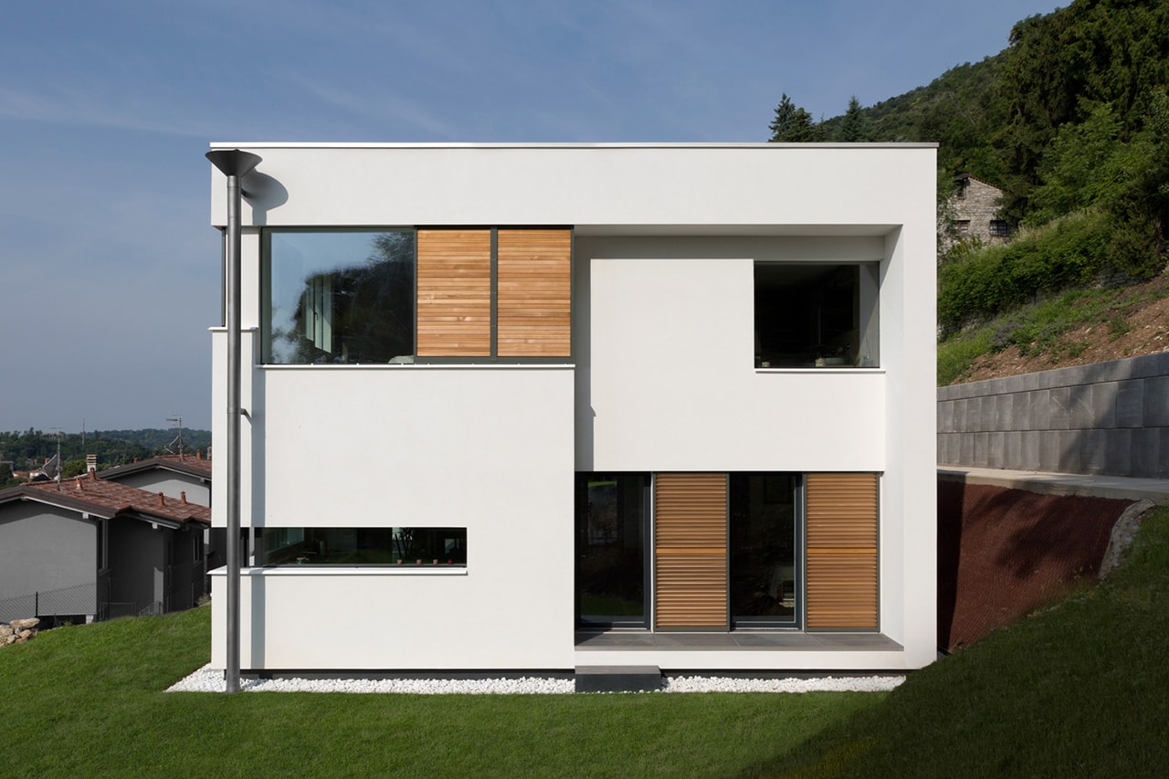Дом NM Studio Ecoarch Варезе Италия дом на склоне холма архитектура дизайн