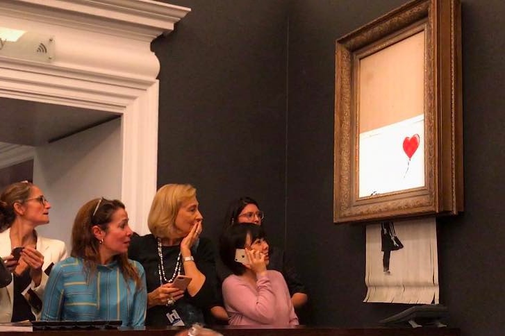 Banksy Artwork Self-Destructs After Being Sold for $1.4 Million USD