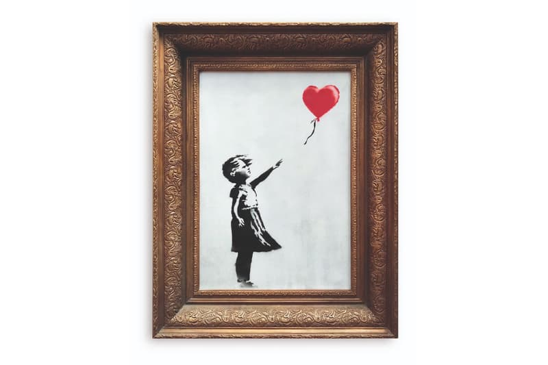 Banksy Artwork Self-Destructs After Auction sotheby's new york city girl with a balloon shredded destroy video street art