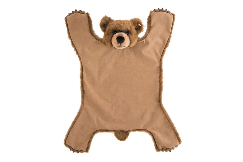 stuffed animal bear rug