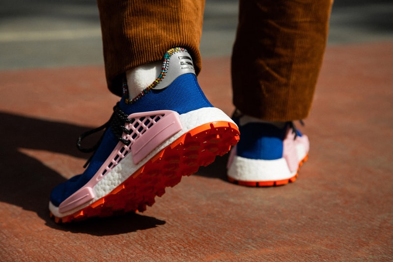 Pharrell x adidas u NMD SOLARHU Pack On foot blue yellow black orange pink white green red
