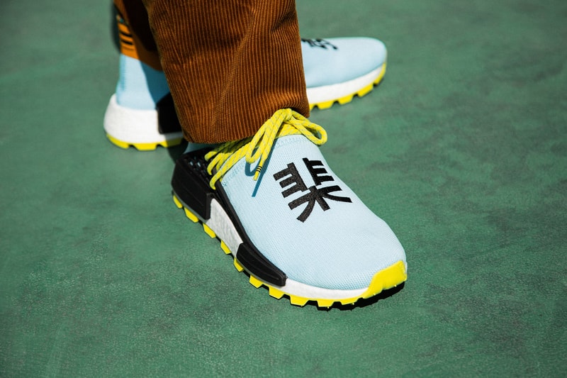 Pharrell x adidas u NMD SOLARHU Pack On foot blue yellow black orange pink white green red