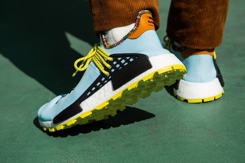 Pharrell x adidas u NMD SOLARHU Pack On foot blue yellow black orange pink white green red