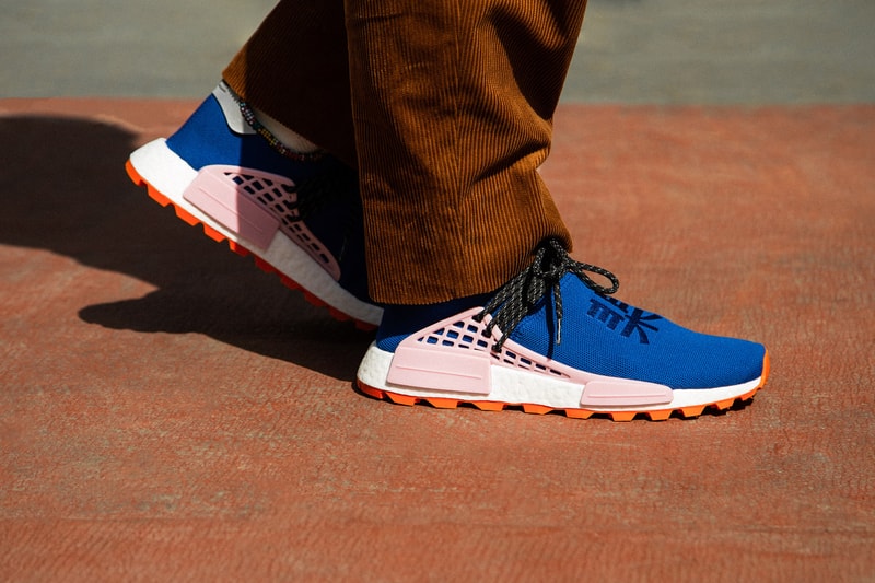 Pharrell x adidas u NMD SOLARHU Pack On foot blue yellow black orange pink white green red