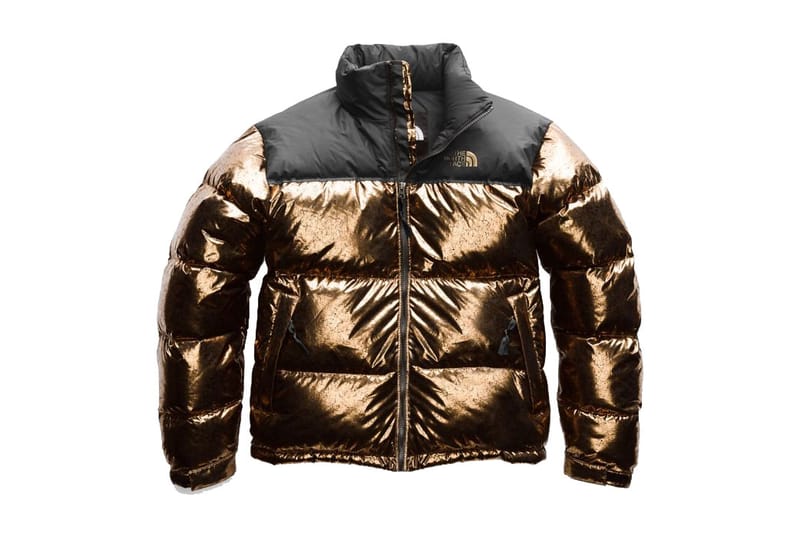 gold and black north face jacket