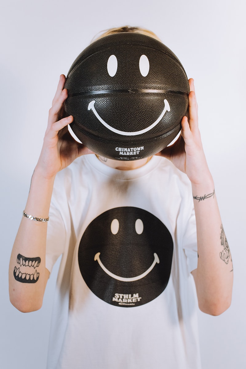 chinatown market caliroots collaboration exclusive tee shirt basketball smiley face black stockholm december 17 2018 release date info buy glow in the dark