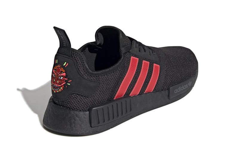 adidas originals nmd r1 trainers in black with red heel block