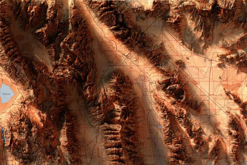 Scott Reinhard Transforms Age-Old Maps into Striking 3D Artworks