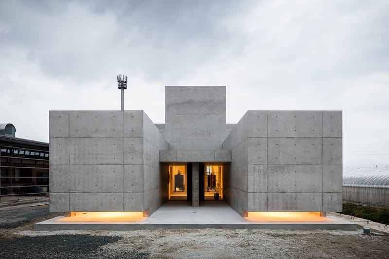 Situated Along a Busy Japanese Highway, a Concrete House of Tranquility