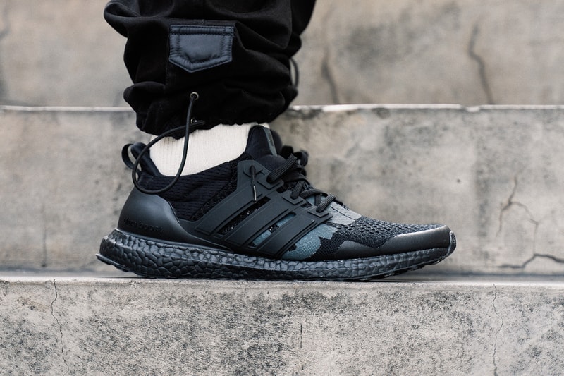 UNDEFEATED x adidas Ultra Boost 1.0 Triple Black Reflective Closer First Look Cop Purchase Buy Sneakers Kicks Trainers Footwear Collab Collaborations