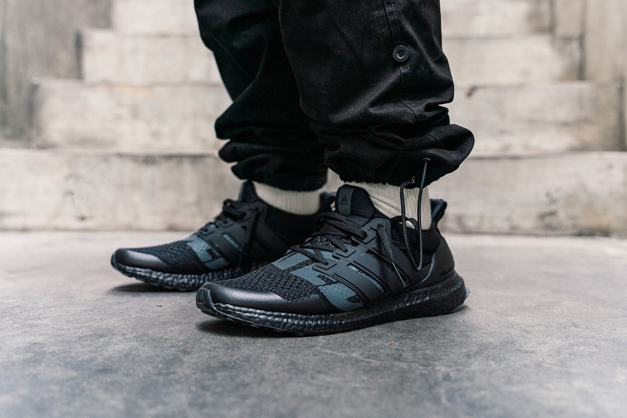 UNDEFEATED x adidas Ultra Boost 1.0 Triple Black Reflective Closer First Look Cop Purchase Buy Sneakers Kicks Trainers Footwear Collab Collaborations