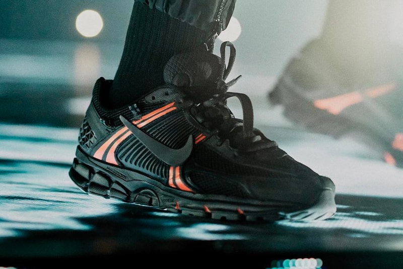 Drake Wears Unreleased Nike Vomero 5+ Sneaker tour scorpion tour red/black colorway release info tease exclusive 'assassination vacation tour'