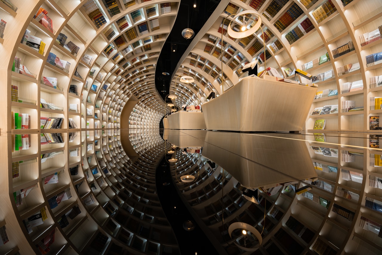 guiyang zhongshuge bookstore xliving architecture architects cave optical illusion design