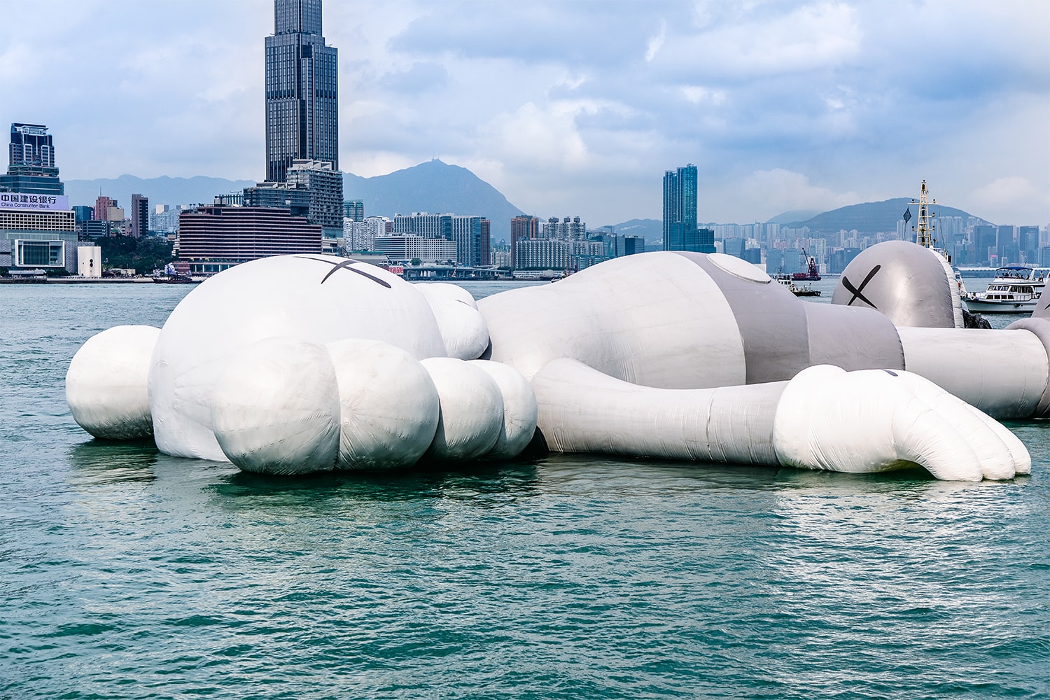 kaws holiday float installation allrightsreserved art basel hong kong 