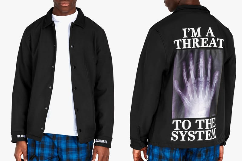 PLEASURES "Threat" Coach Jacket Makes an Edgy Statement