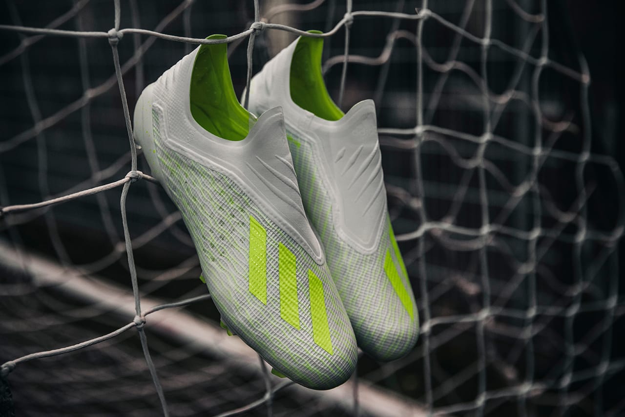 adidas green and white football boots