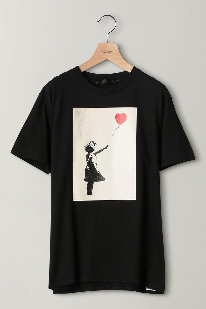 Banksy for BEAUTY & YOUTH UNITED Girl with balloon shredded tee shirt collaboration exclusive black white print graphic