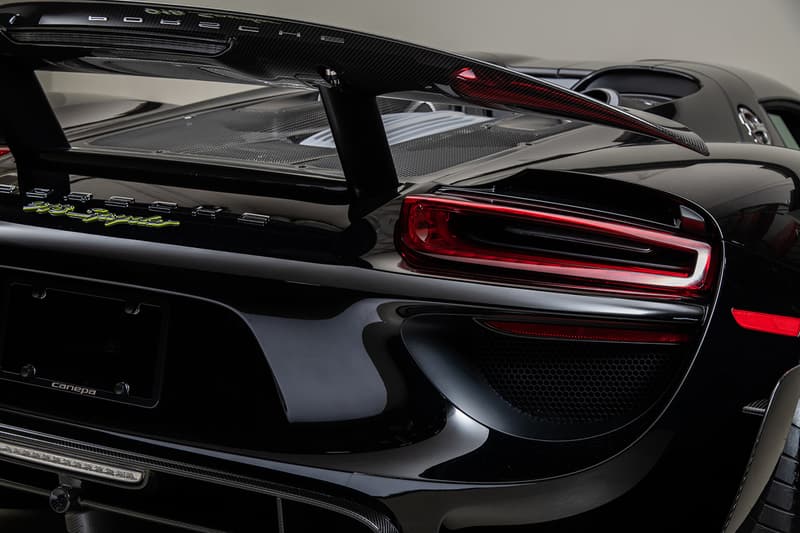 Porsche 918 Spyder Hybrid Onyx Black Silver Accents Environmental Super Car Hypercar Weissach Package 628 miles magnesium motorsport wheels, lighter brake design titanium bolts chassis rear carbon fibre spoilers 214 mph 875bhp 2.4seconds 944 lb-ft torque 4.6ltr V8 Race Engine