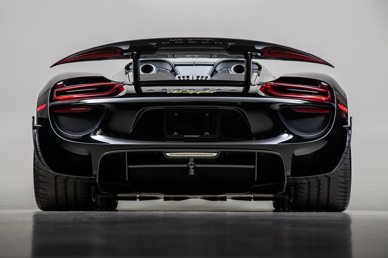 Porsche 918 Spyder Hybrid Onyx Black Silver Accents Environmental Super Car Hypercar Weissach Package 628 miles magnesium motorsport wheels, lighter brake design titanium bolts chassis rear carbon fibre spoilers 214 mph 875bhp 2.4seconds 944 lb-ft torque 4.6ltr V8 Race Engine 